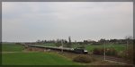 189 159 der MRCE, für DB, mit Schwellenzug aus Möllenhagen in Richtung Rostock am 15.04.2016 bei Vielist 