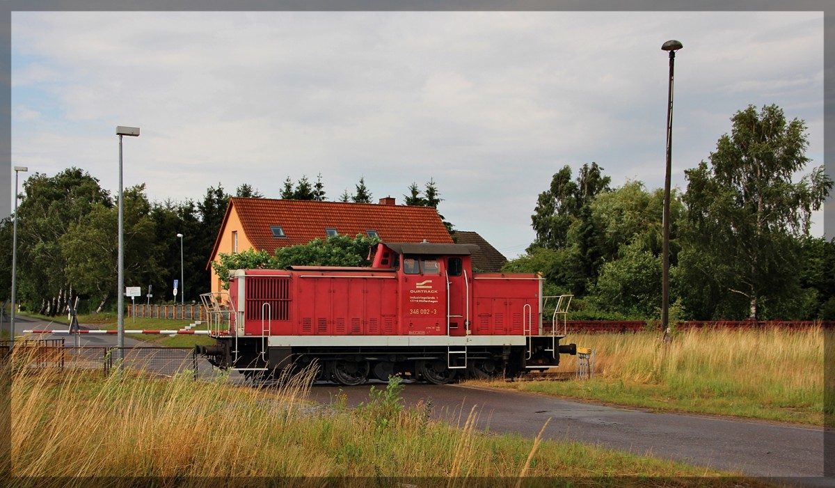 346 002 des Durtrack Werkes in Möllenhagen am 08.07.2015 bei Rangierarbeiten im Bahnhof Möllenhagen.