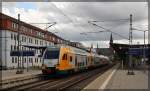 445 109 der ODEG als RE4 nach Wismar bei der Ausfahrt aus Schwerin Hbf am 26.07.2015